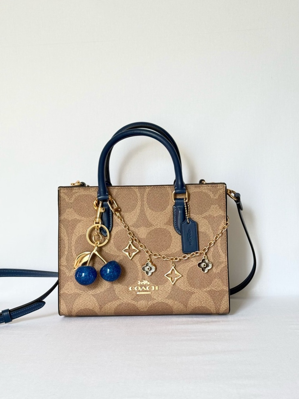 Coach Maggie Small Tote
Signature Canvas Tan/deep blue Gold hardware NWT